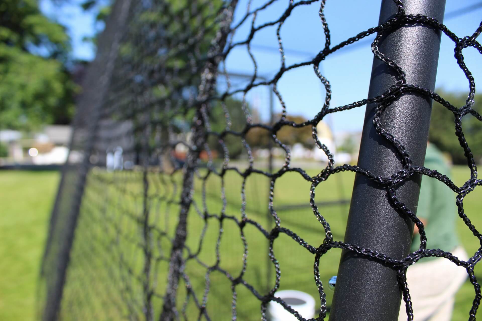 Close up of the trapezoid netting on top of the poles