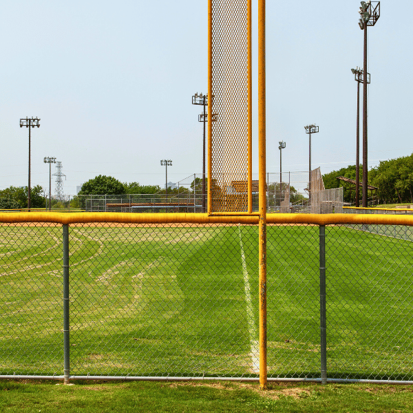 Foul pole and home run fencing at baseball field