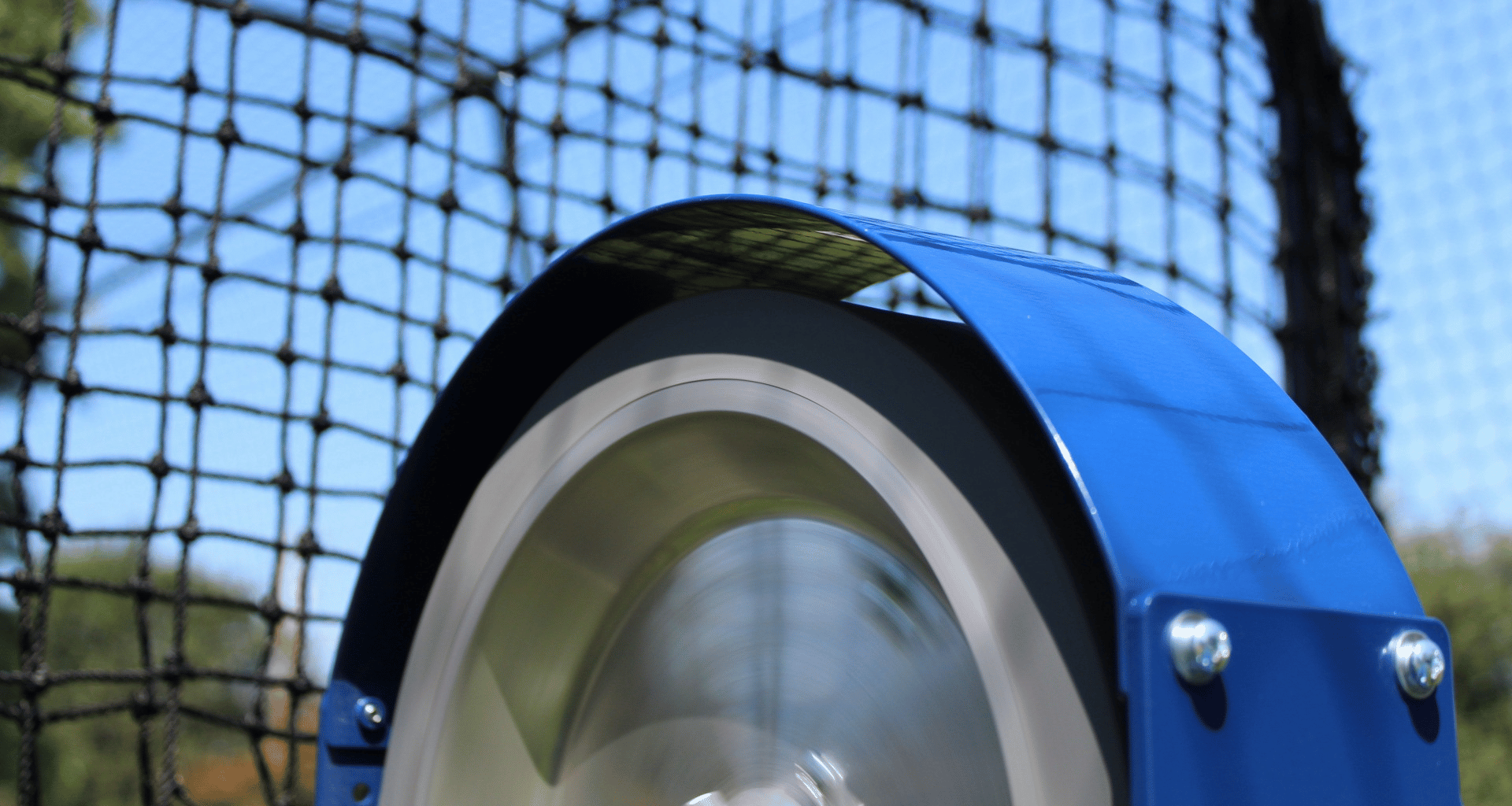 Bata pitching machine up close view of the top fender that protects the wheel