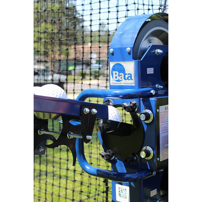 Auto feeder feeding baseballs into the BATA-2 Pitching Machine