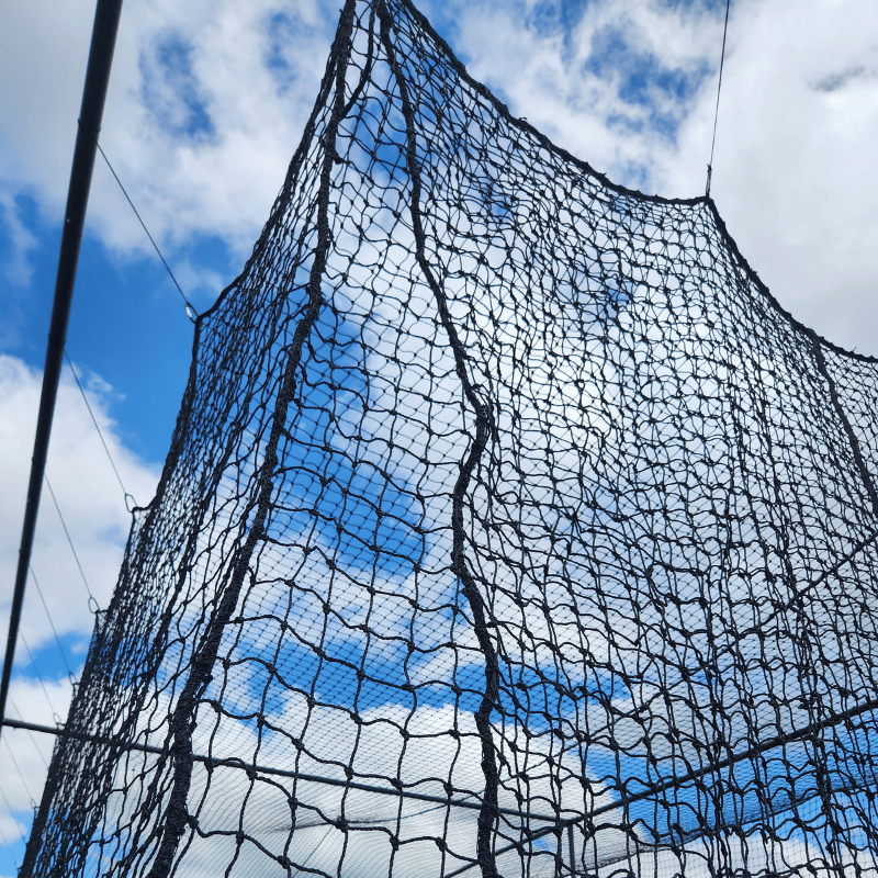 Close up of The Thumper Batting Cage netting door