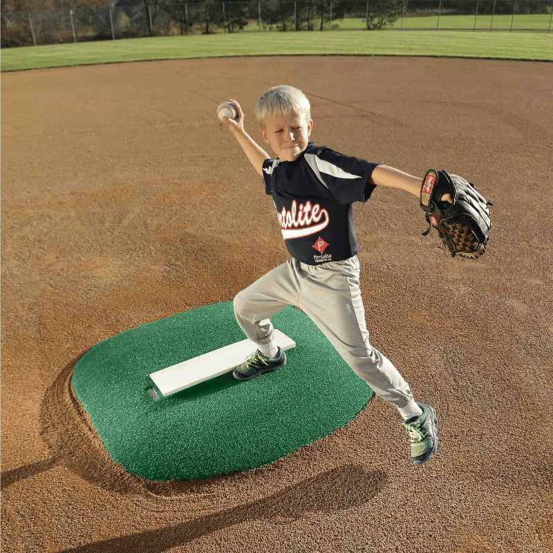 Boy pitching on Portolite 4in Stride Off Game Mound Green