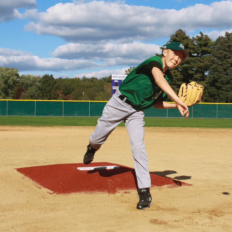 Boy pitching on ProMound Minor League Mound Clay