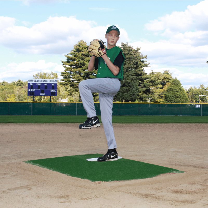 Boy pitching on ProMound Bronco Mound Green