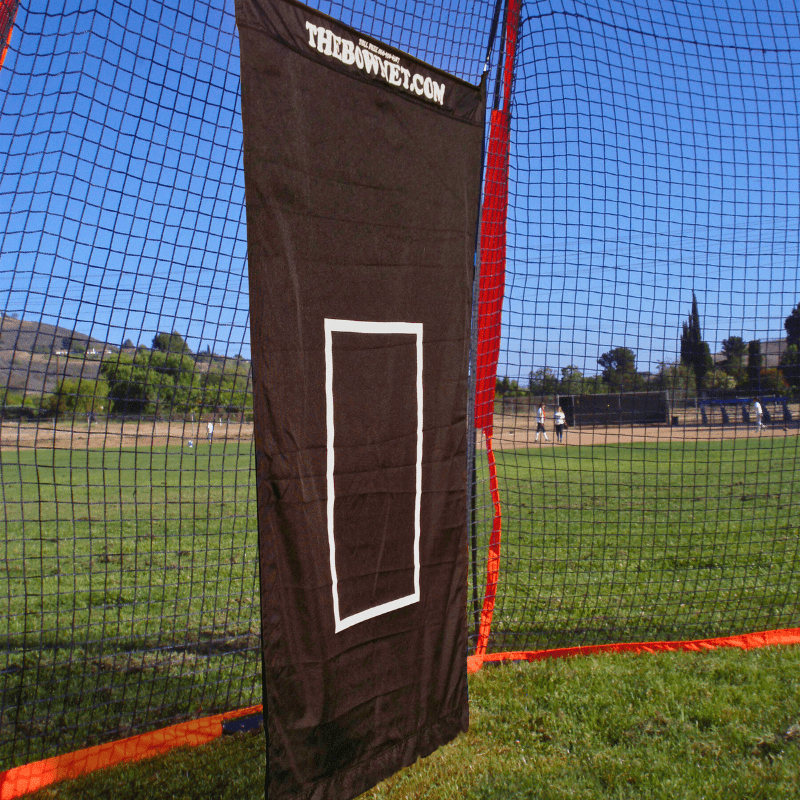 Close up of backdrop Bownet Portable Backstop on green grass
