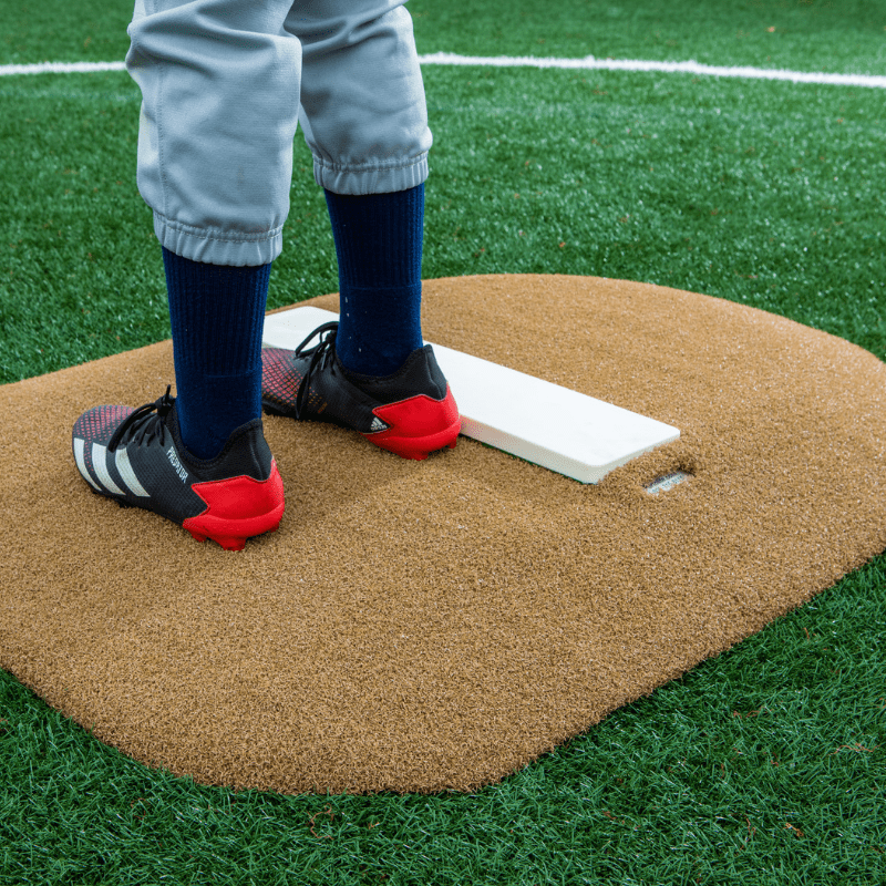 Boy pitching off of the  4in Economy Youth Mound