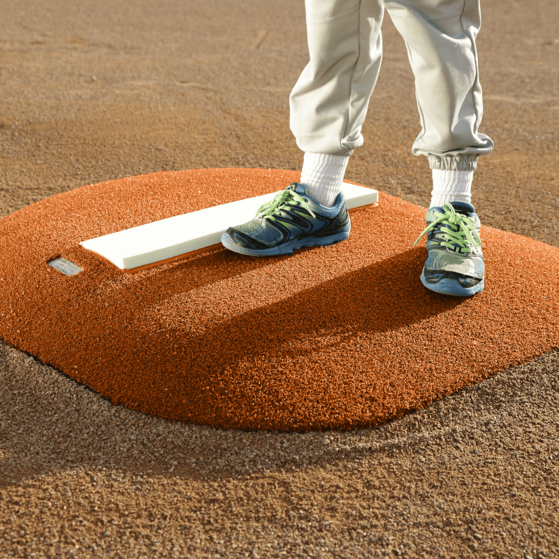 Boy pitching off of the 4in Economy Youth Mound