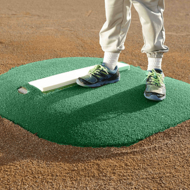 Boy pitching off of the 4in Economy Youth Mound