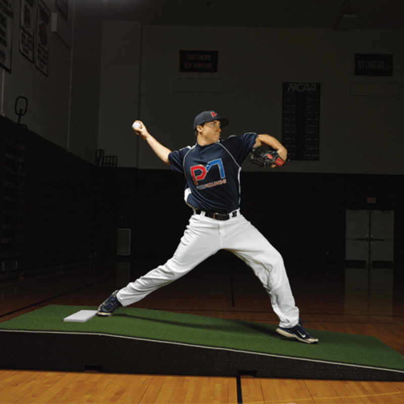 Man pitching off of the ProMound Collegiate Mound Green