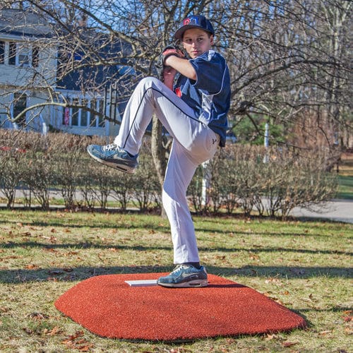 Boy pitching off of the ProMound 5070 Youth Game Mound