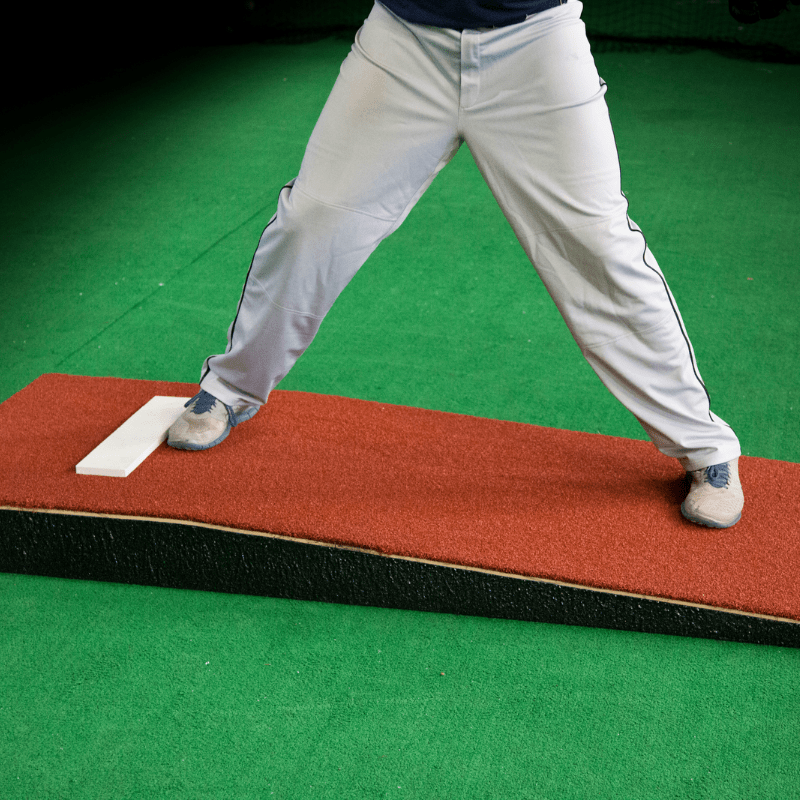 Boy pitching off of the ProMound Junior Mound