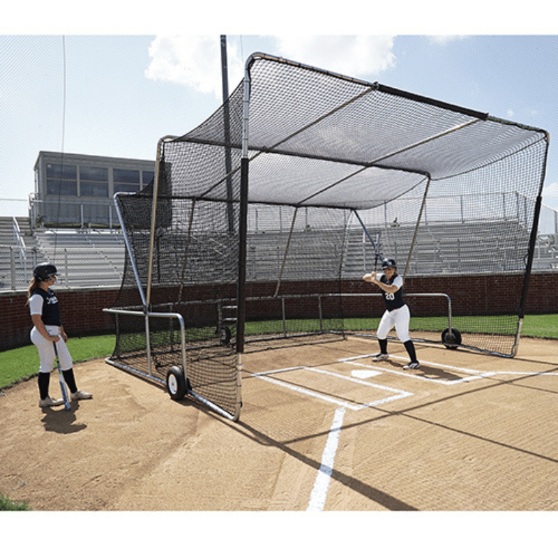 BS 4000 Foldable Portable Batting Cage with a batter on the inside ready to hit a softball